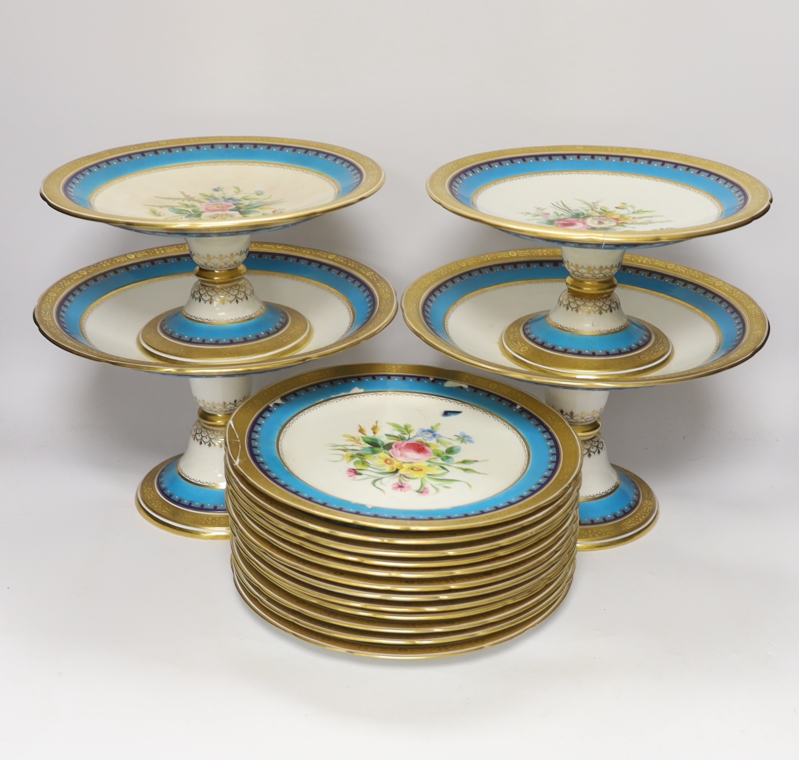 A 19th century Minton porcelain dessert service with gilt and floral decoration, twelve plates and two pairs of various height comports, tallest 16.5cm high